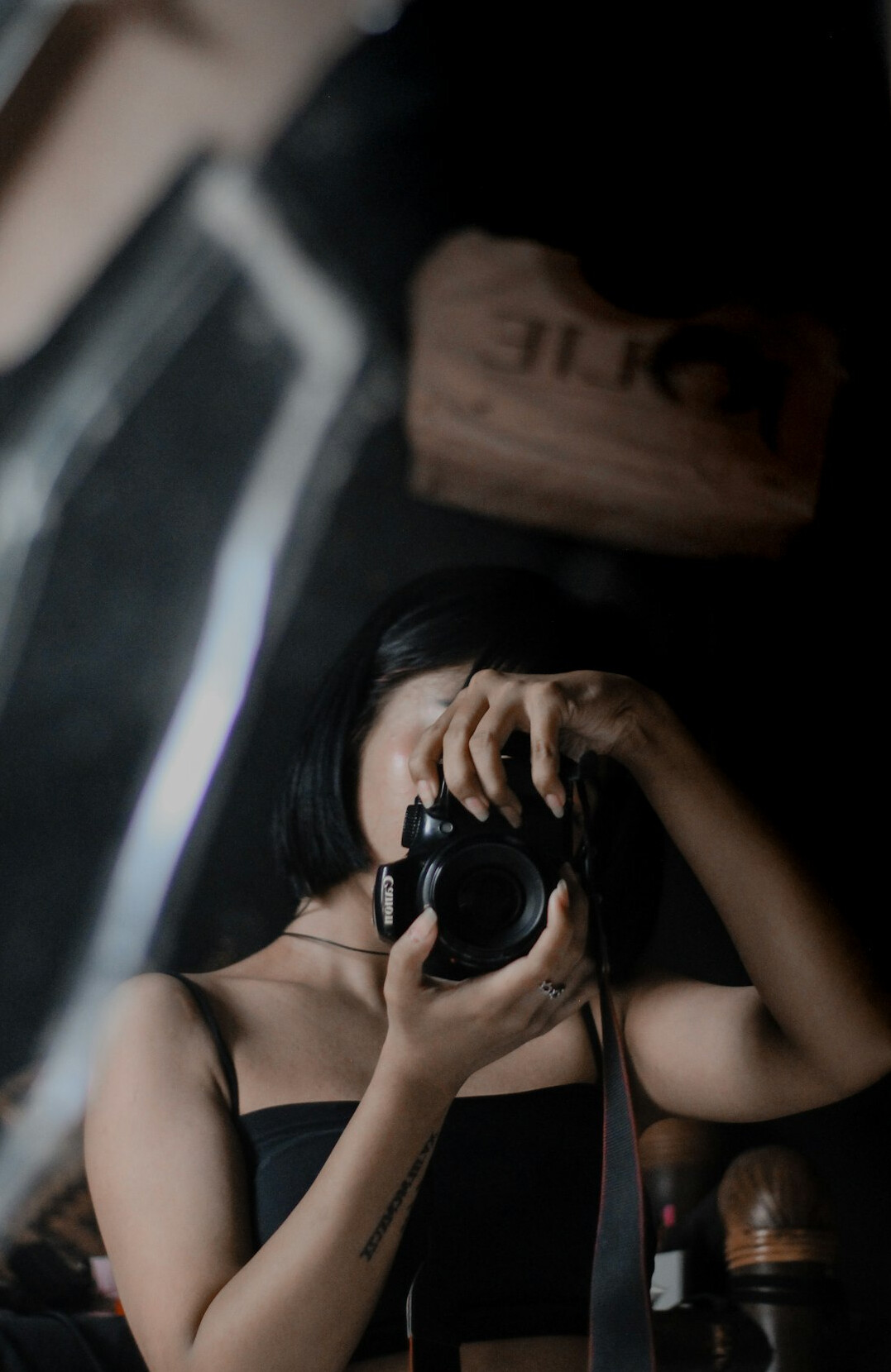 Studio portrait of a woman photographer